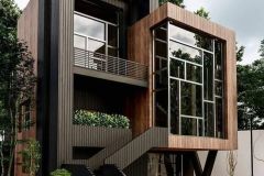 black and brown contrast with full glass front walls