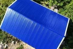 Blue-A-frame-roofing-for-a-zero-maintenance-roofing