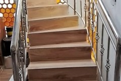 elaborate-rods-stainless-handles-wooden-steps