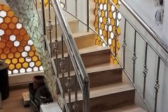 stainless-rods-on-wooden-steps