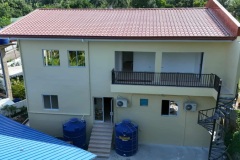 two-large-rain-water-collection-tanks-at-the-back-icf-house-negros-oriental